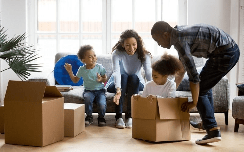 A family moving into their new home.