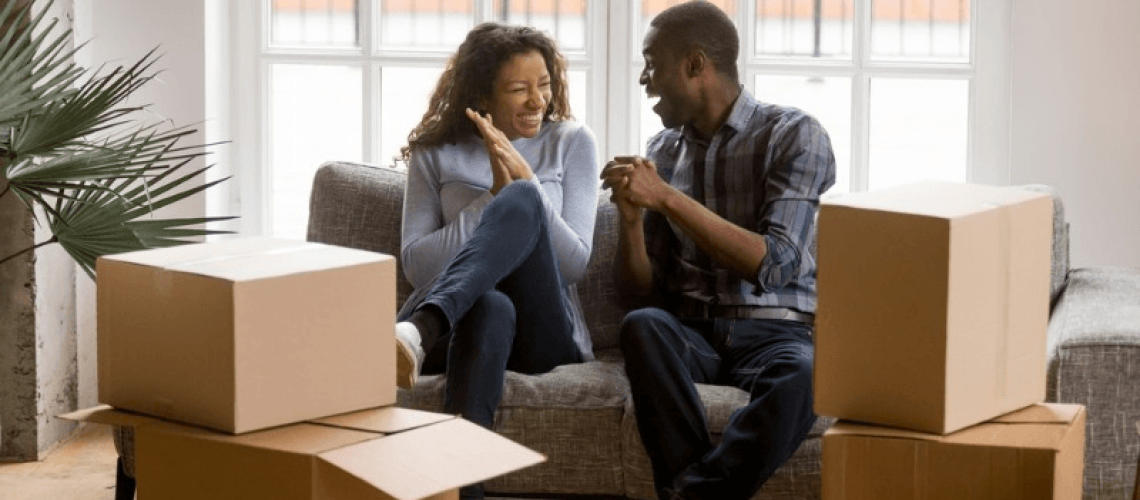 A young couple ready to move to a new place.